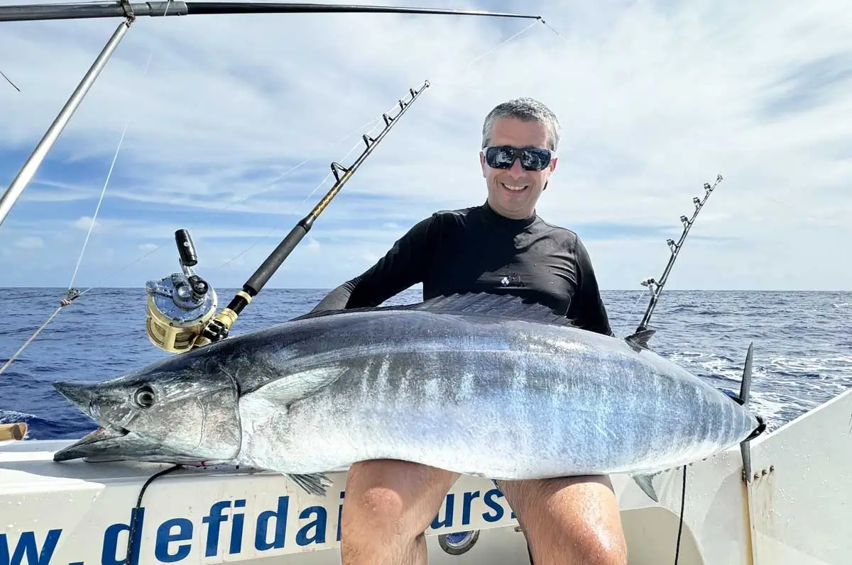 Angler with a wahoo caught on a big game fishing trip in Rodrigues